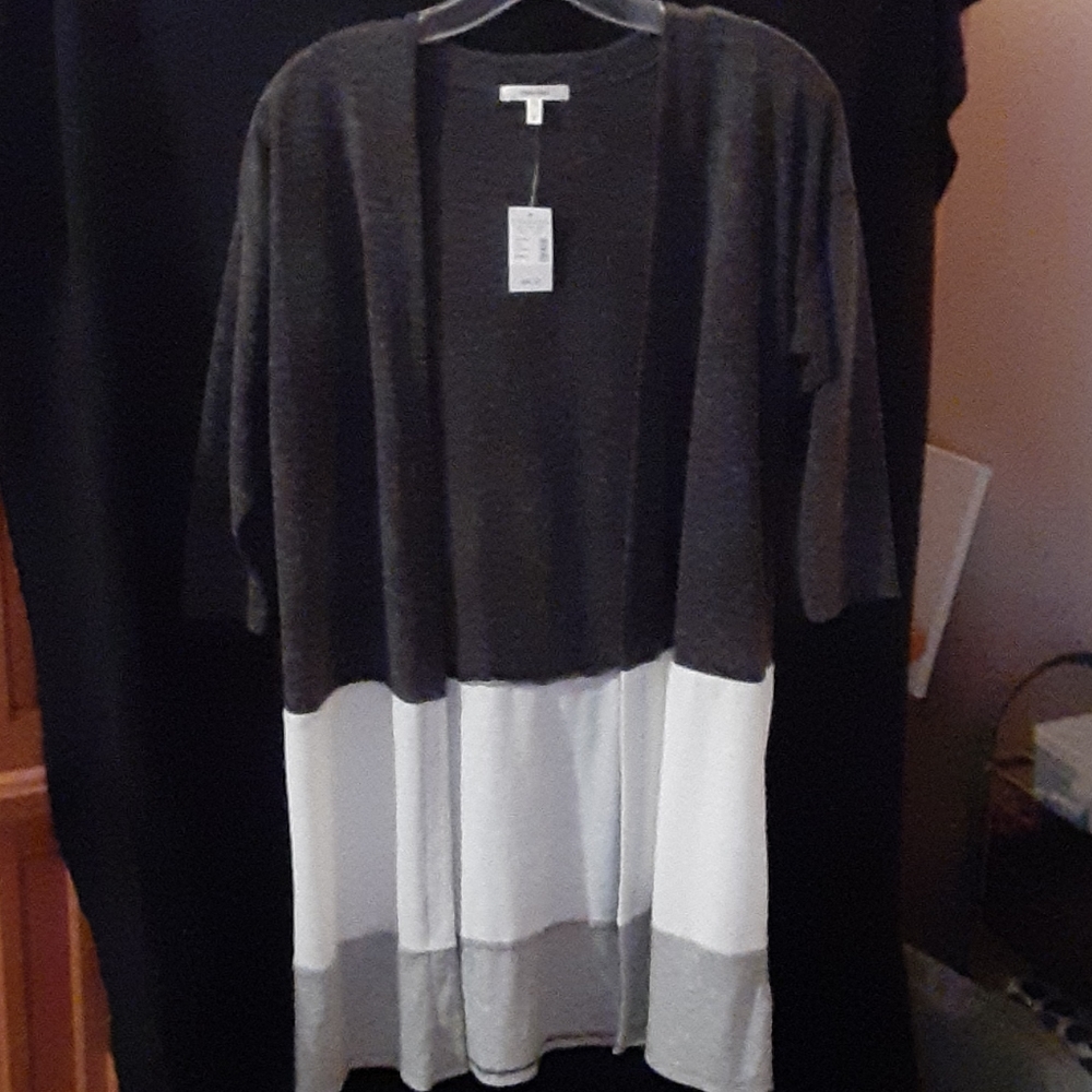 Brand new cardigan, beautiful and business savvy